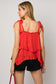 Sleeveless Asymmetrical Hem Line Tiered Top